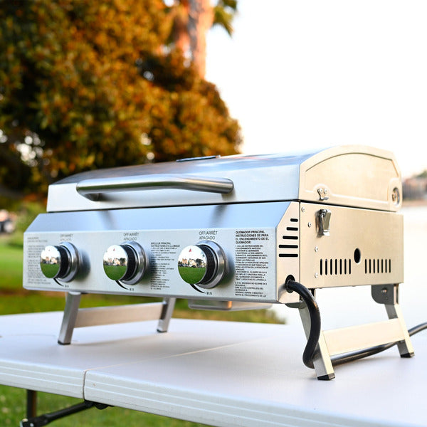 NXR three-burner portable propane barbecue, alternate outdoor view